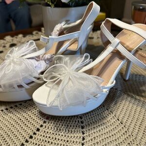 White stiletto heels